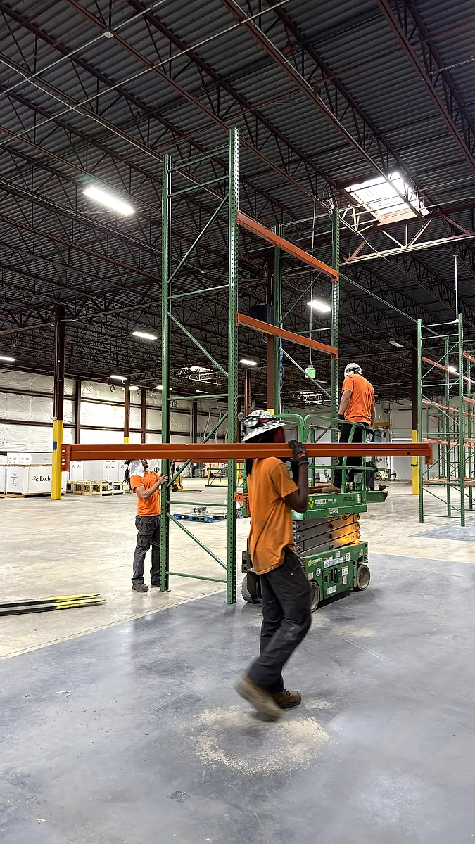 Racking crew working together on a new rack row