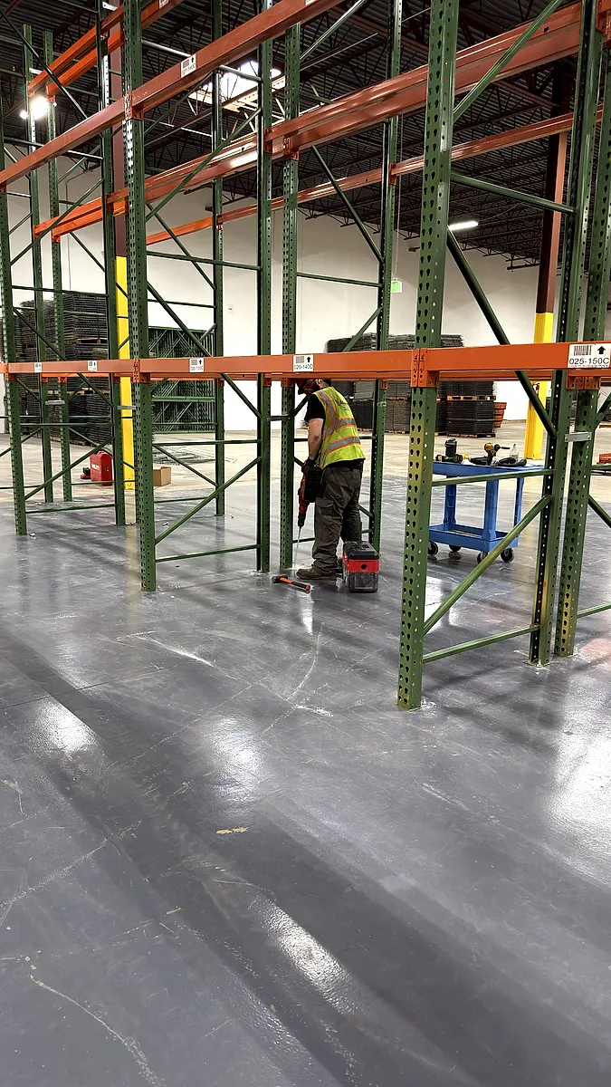 Crew completing a pallet rack bay