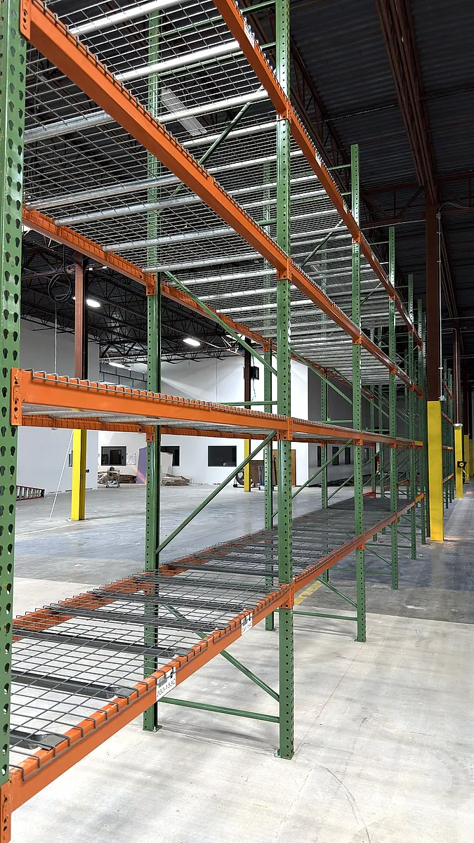 Pallet rack with wire decking installed on each level